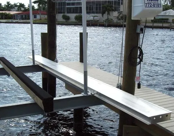 Aluminum walkway installed alongside a boat lift for improved dockside access.