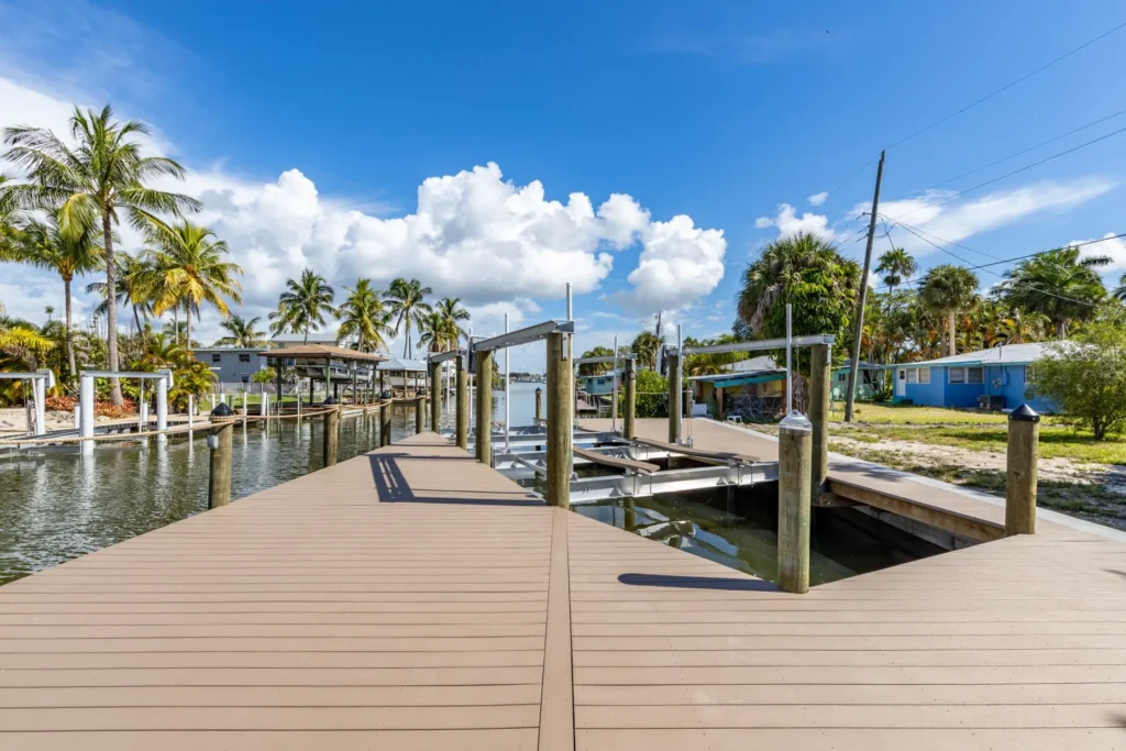 A custom boat lift installation showcasing a sturdy platform and efficient lift mechanism on a waterfront dock.